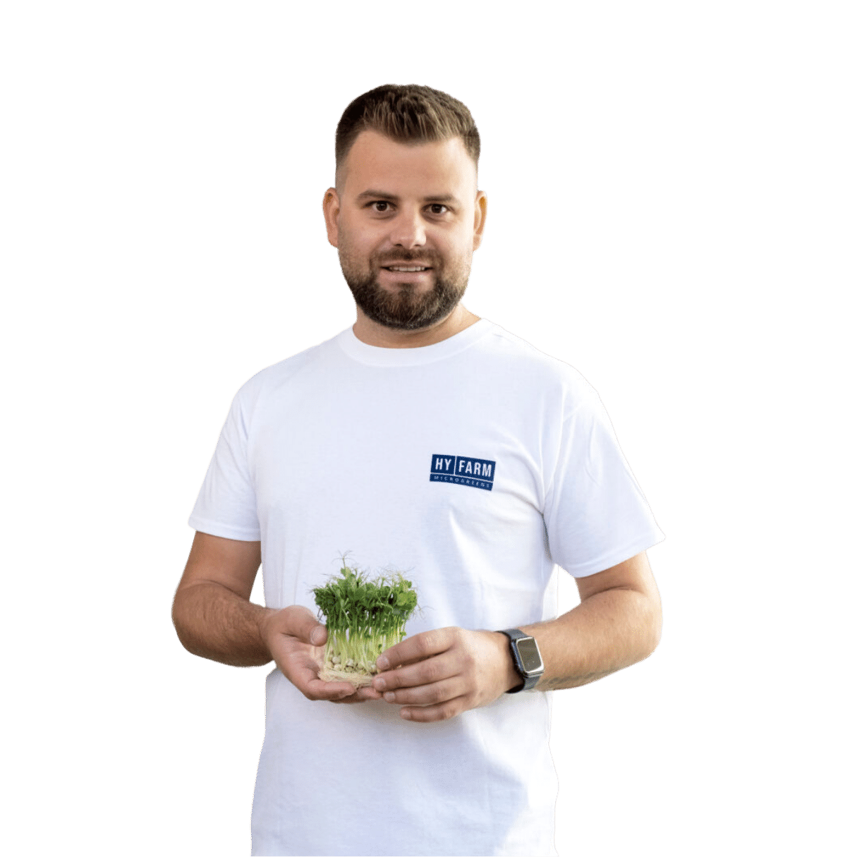 Alex Vasiu holding microgreens